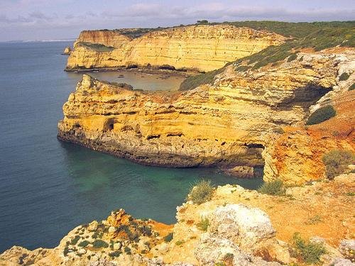 golden limestone cliffs algarve coast near carvoeiro portugal