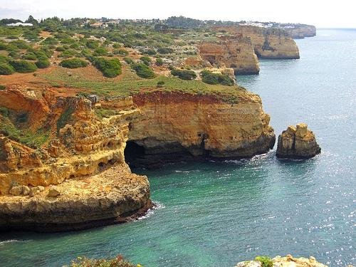 hidden cove with turquoise water algarve near carvoeiro portugal