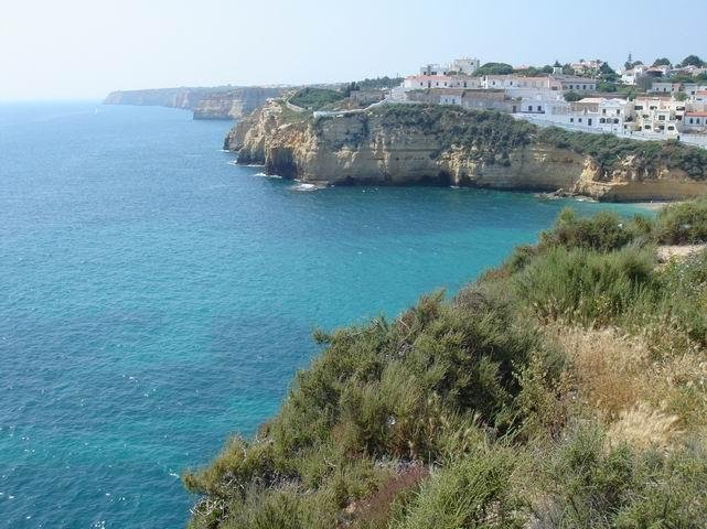 carvoeiro bay turquoise water cliffs algarve portugal