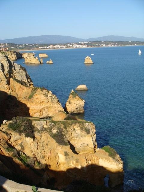 coastal rock formations algarve sea stacks carvoeiro portugal