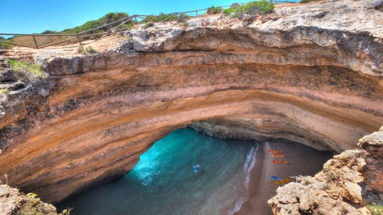 small beach between cliffs algarve coast near carvoeiro portugal
