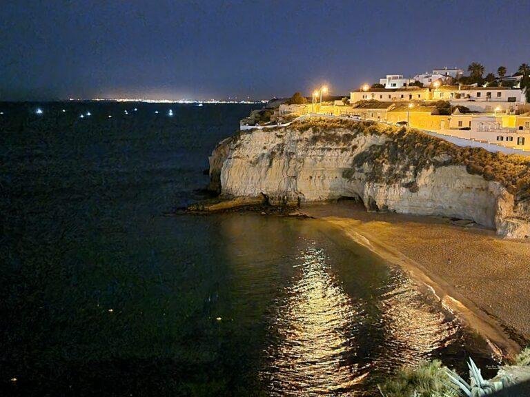 sandy beach with golden cliffs carvoeiro algarve portugal