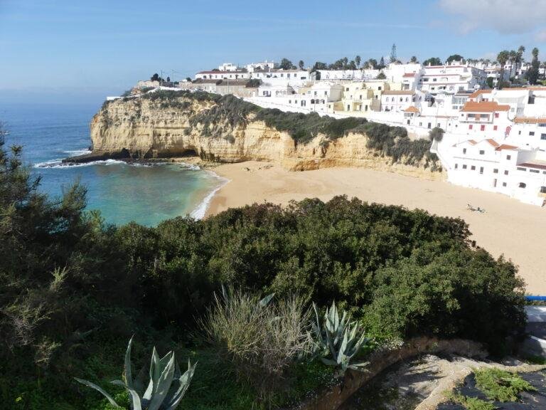 cliffs and village houses overlooking carvoeiro beach algarve