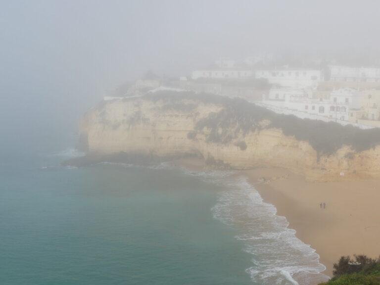 misty coastline with cliffs algarve near carvoeiro portugal