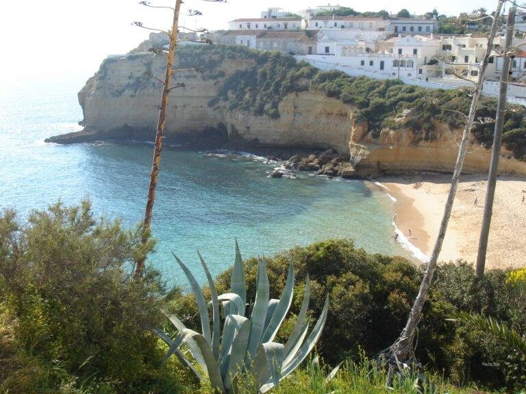 white village above beach carvoeiro algarve portugal