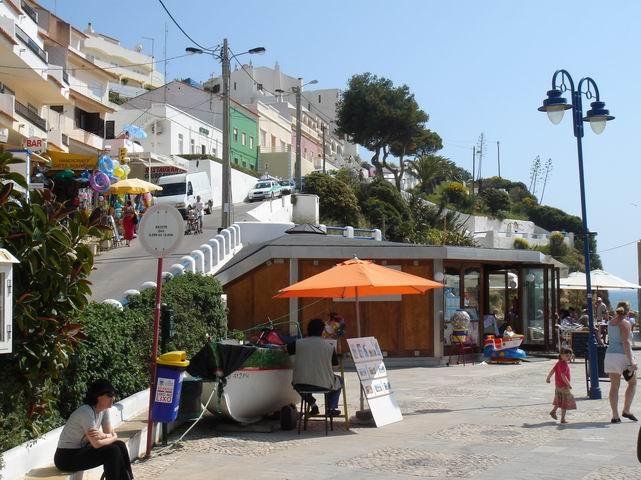 small square with cafes in carvoeiro algarve portugal