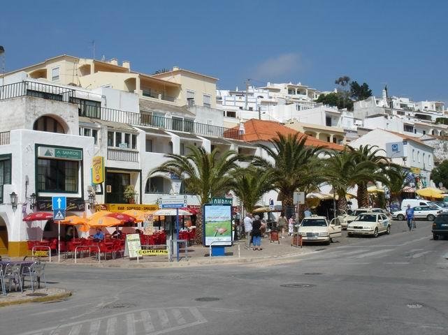 central square with palm trees in carvoeiro algarve portugal