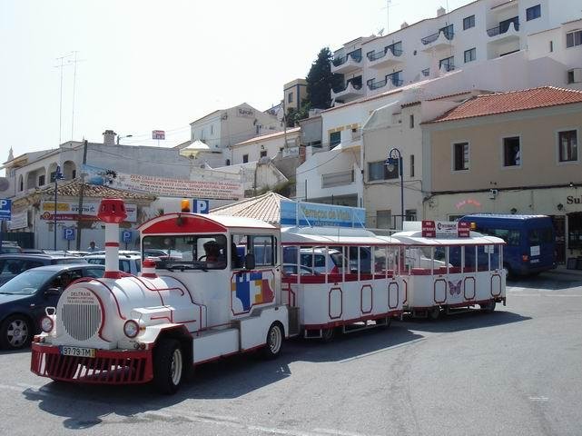 tourist train near carvoeiro beach algarve portugal