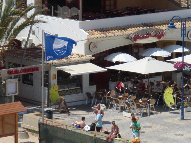 restaurant terrace overlooking blue flag carvoeiro beach algarve portugal