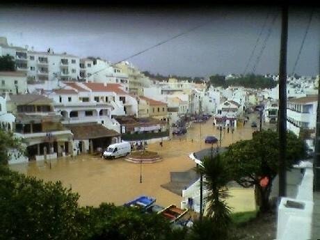flooded carvoeiro beach square after heavy rain algarve portugal
