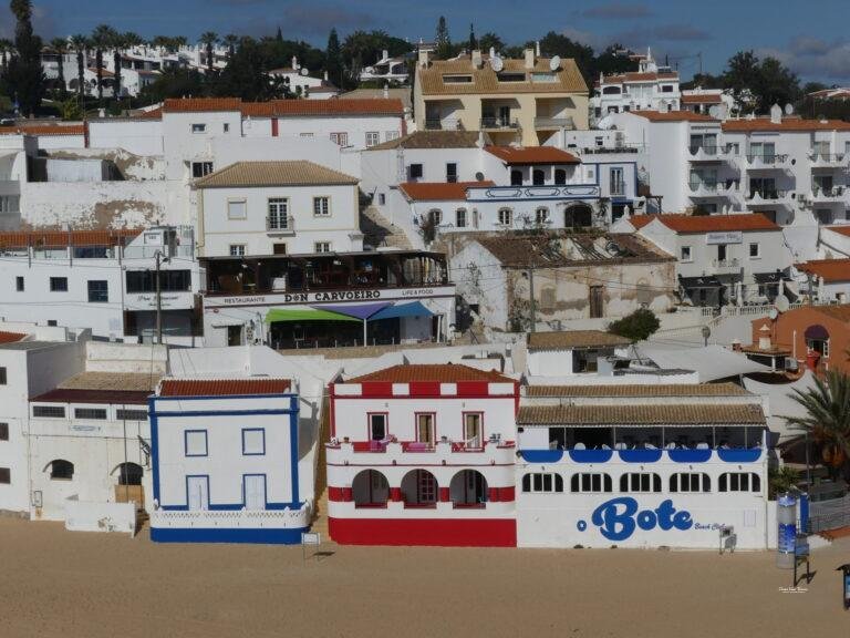 colorful houses on carvoeiro beach algarve portugal