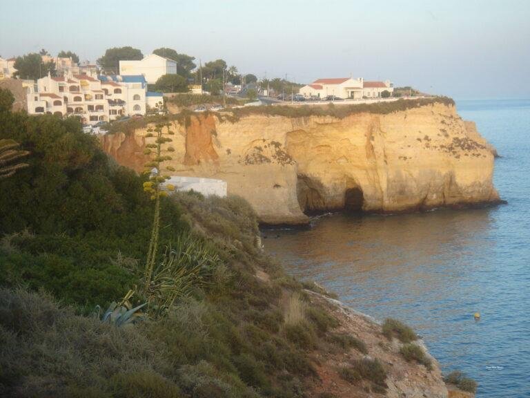 ocean view terrace on cliff next to rocky promontory carvoeiro algarve portugal