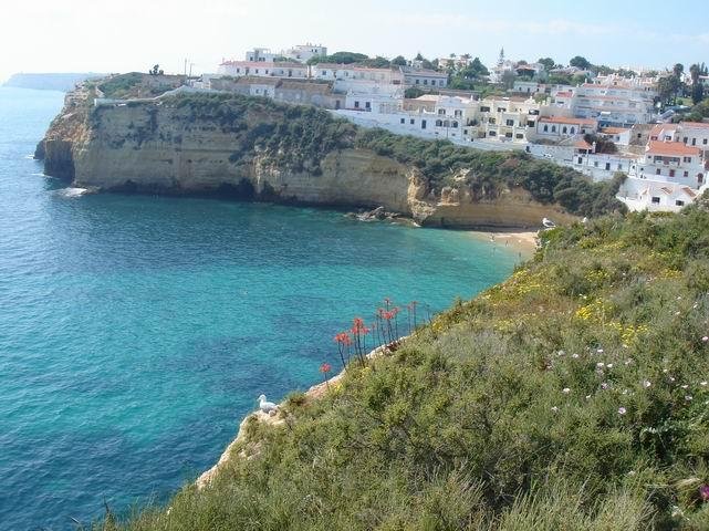 view from ocean view terrace across turquoise bay carvoeiro algarve portugal