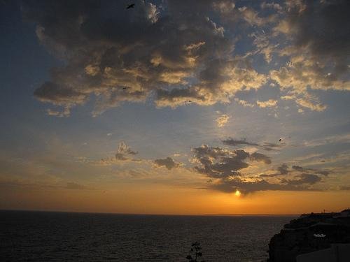 dramatic sunset sky algarve coast