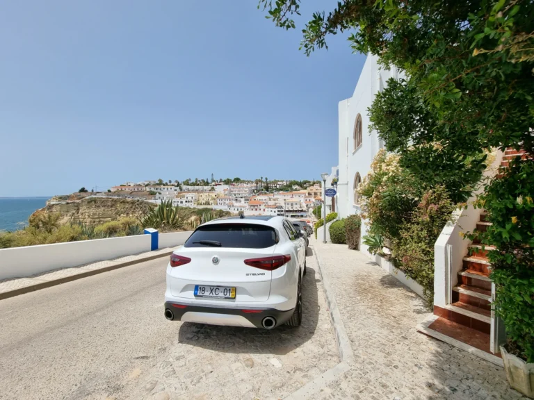 parking in front of ocean view terrace entrance carvoeiro algarve portugal