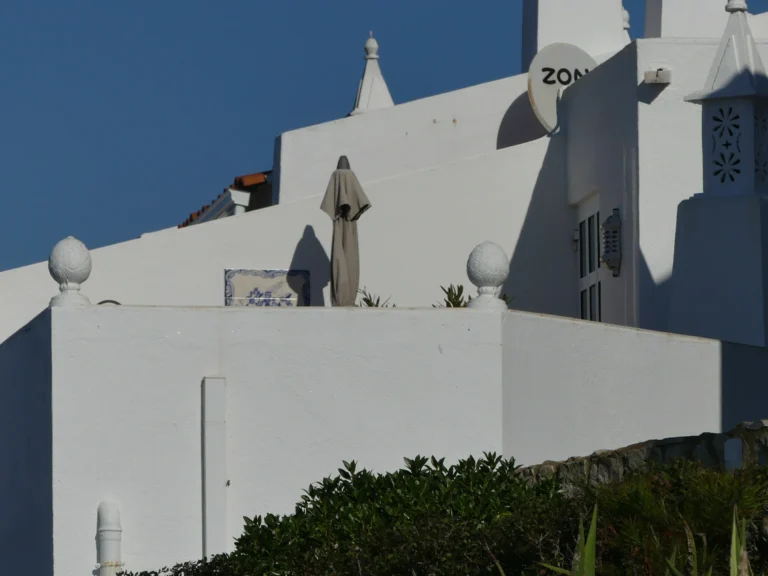 white facade ocean view terrace carvoeiro portugal
