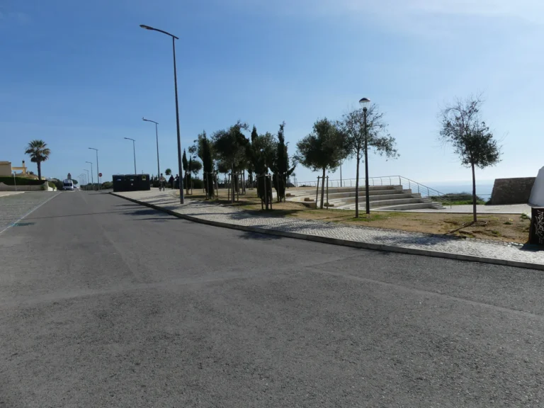 road near oceanfront carvoeiro algarve portugal
